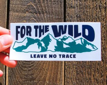 A picture of sticker that reads, For the Wild, Leave No Trace.