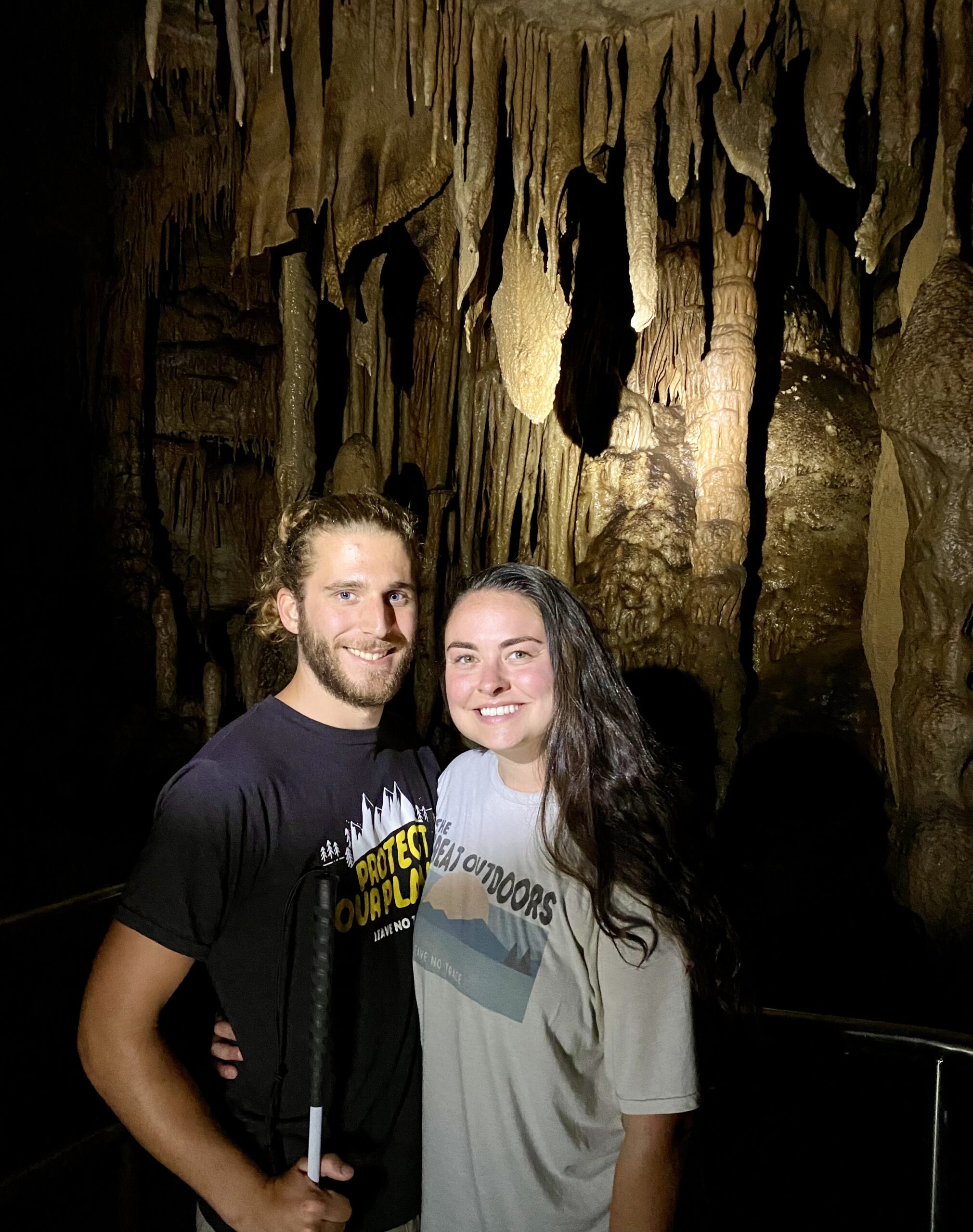 Luke and his wife Becca in a cave