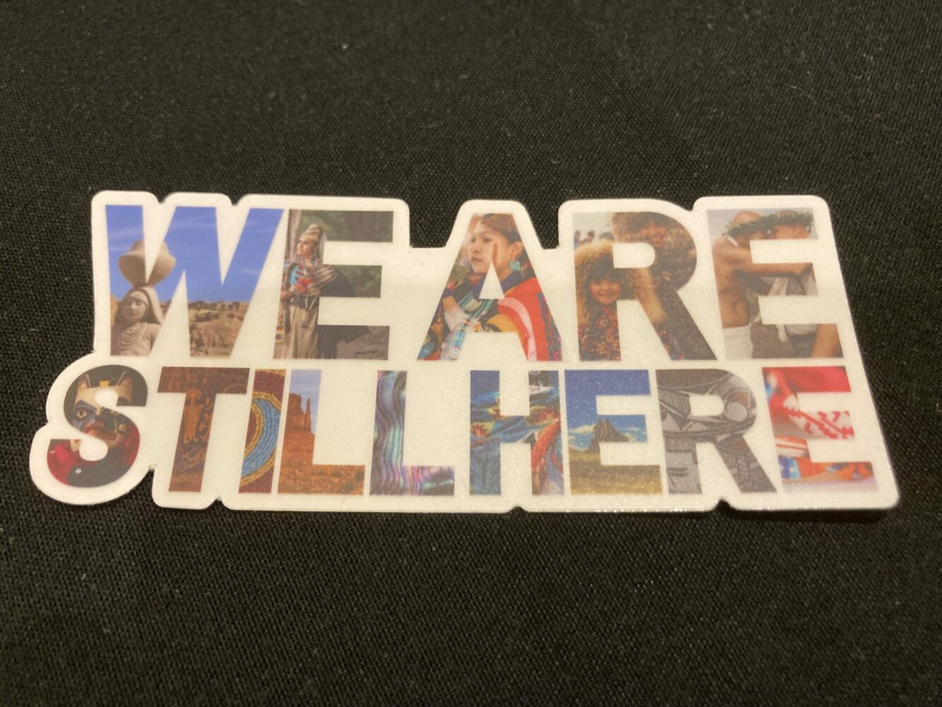 'We Are Still Here' graphic logo from 2024 American Indigenous Tourism Conference hosted by AIANTA and the Choctwa Nation of Oklahoma